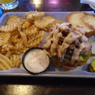 Big, juicy, savory, Big Tex Burger with waffle fries.