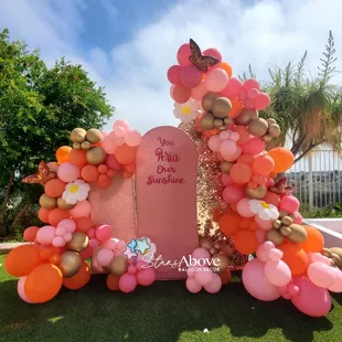 3 backdrop filed with balloons