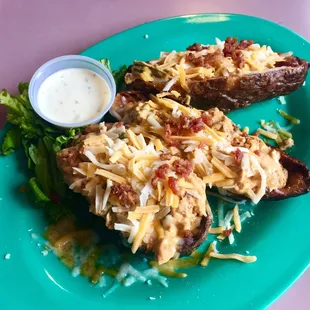 Jalapeño Popper Potato Skins. Very cheesy, not too spicy. Skins were a little tough but the goodness on the inside was worth ordering!