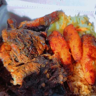 Jerk Chicken, rice and peas, plantains and cabbage!