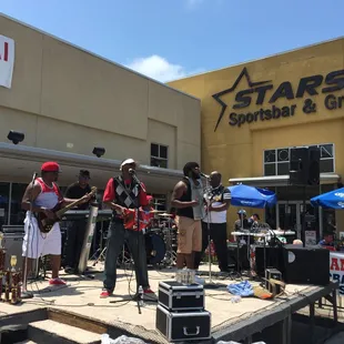 a band performing on stage