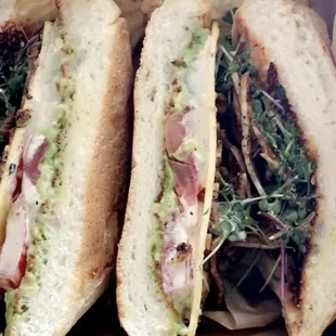 a sandwich and chips in a box