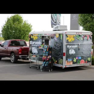 a food truck parked in a parking lot