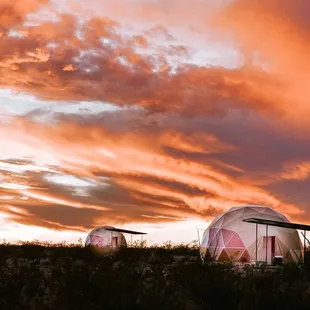We have 4 domes total. 2 domes accommodate 2 people, &amp; 2 accommodate 4 people.