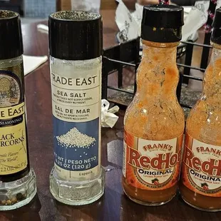 a variety of bottles of hot sauce