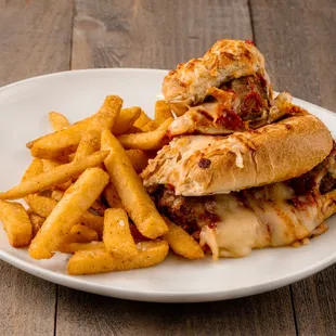 a plate with a sandwich and french fries