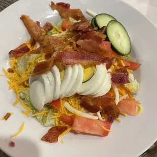 Side salad with bacon, cheese and eggs