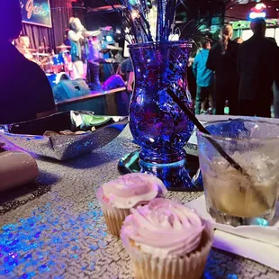cupcakes and a drink on a table