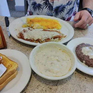 My Husband ordered the Hamburger patty med rare, hash browns, scrambled eggs with cheese and white toast.