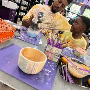 In the process of painting the pottery