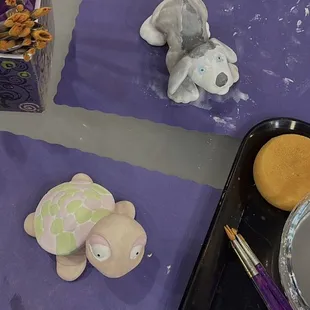 Painting a small turtle and dog