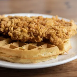 a fried chicken and waffle on a plate