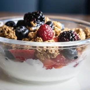 a bowl of yogurt and berries