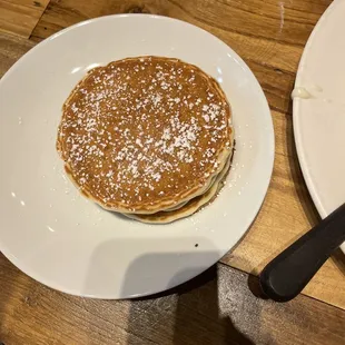 Delicious pancakes with warm syrup