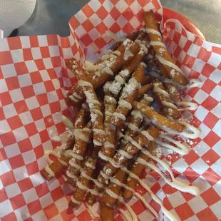 Funnel fries with icing is the only way to go!