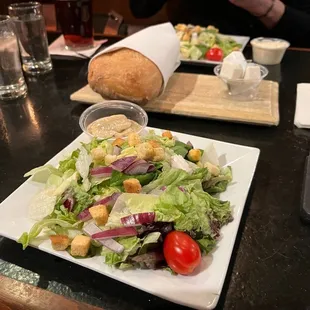 Salad and fresh baked loaf of bread. Great!