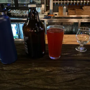 A tall beer and a growler!