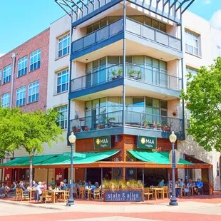 a view of a restaurant on a sunny day