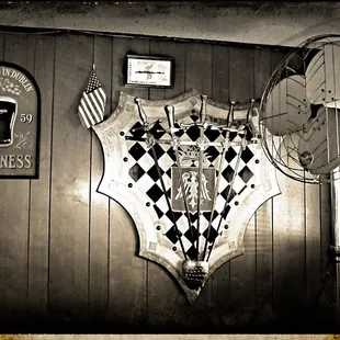 a large shield and a fan