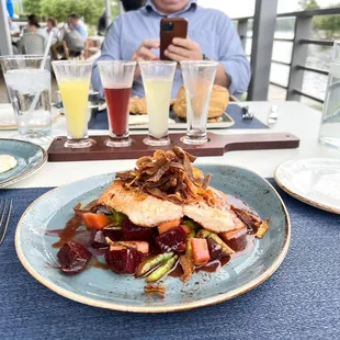 Lighter fare, salmon w/ grilled asparagus, carrots and beets and flight of mimosas