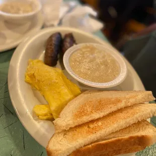 Two Eggs (Any Style), Link Sausage, Grits (Bowl) and toast.