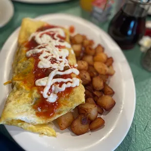 Ms. Carol&apos;s Wolf Packer Grilled Chicken and Home Fries. Added jalapeños and mushrooms to my omelette.