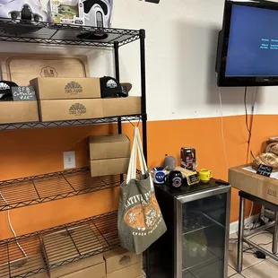 shelves of food and a television