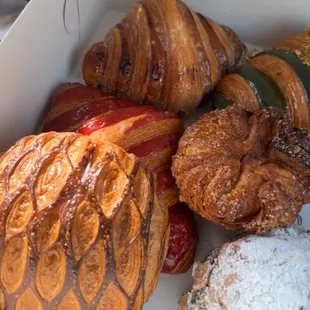 Chocolate croissant, guava croissant, chocolate almond croissant, pistachio croissant, butterscotch croissant.