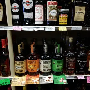 a shelf of liquor bottles