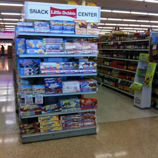 a snack aisle in a grocery store