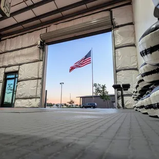 Roll up doors with out nations flag.