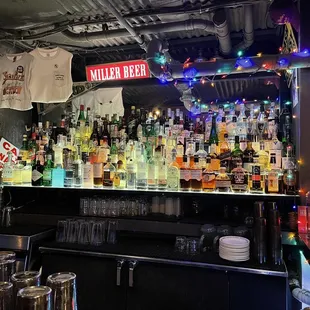 a bar filled with alcohol bottles