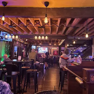 Inside, upstairs salsa night..changes nightly upstairs.