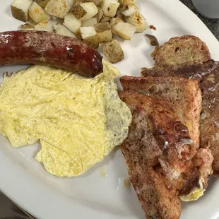 American fries, raspberry fritter French toast, scrambled eggs, and wild rice sausage