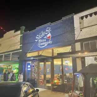 cars parked in front of the restaurant