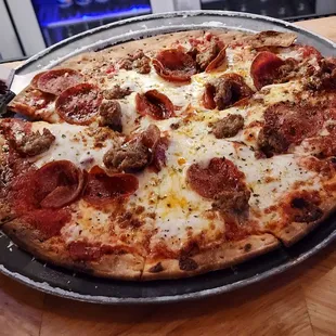BYO 10" thin crust spicy Italian sausage and pepperoni.