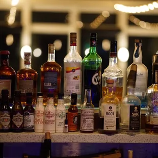 a variety of liquor bottles