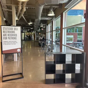 See how they try to block off the entrance and have a sign so no one can use the bathrooms anymore?