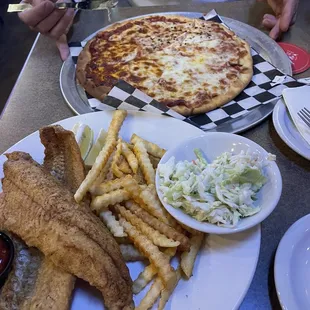 a plate of fried fish, fries, and a pizza