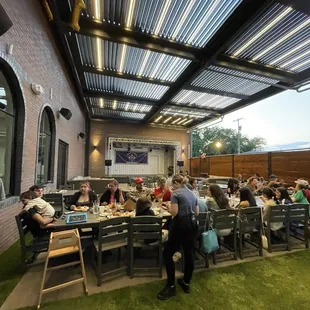 Outside seating with a stage for bands on the weekends