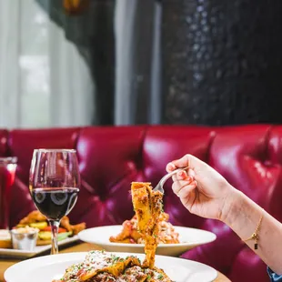 Unwind with a rustic, hearty pasta dish, capturing the richness of summer