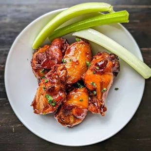 Station Wings: You can have them plain or tossed in Buffalo, truffle, or our famous chipotle maple BBQ.