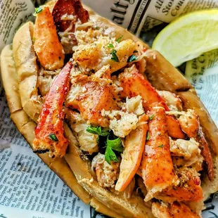 Chunks of lobster on a toasted buttered New England roll. Maine and Connecticut Styles available.