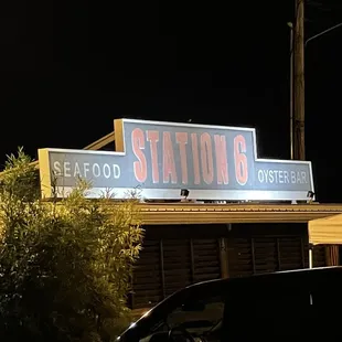 the neon sign for station 6