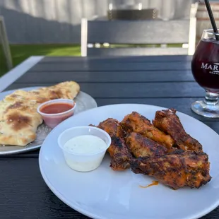Happy hour wings and garlic cheese bread with a sangria