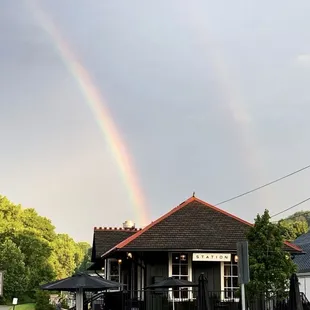 a double rainbow in the sky