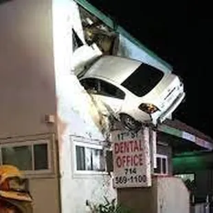 a car falling off the side of a building