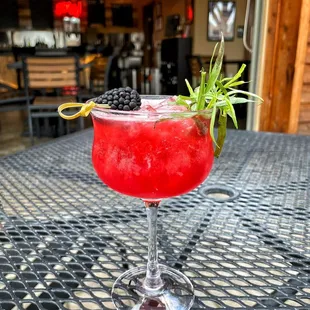 "Mr. Purple" ($10) - gin, blackberry tarragon reduction, hibiscus absinthe, honey, lemon, bitters and seltzer