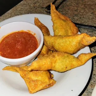 Spinach, Artichoke, &amp; Ricotta Rangoon.  Side of marinara for dippin&apos;