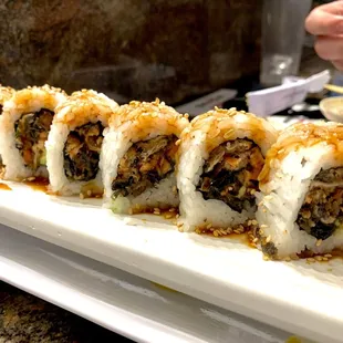 Salmon Skin Roll with &quot;eel sauce.&quot;  I prefer it with ponzu but it was still crunchy enough.